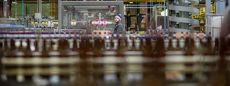 An employee works on the bottling line on Tuesday, Jan. 12, 2016, at SweetWater Brewing Company in Atlanta, Ga. (AJ Reynolds for The Brewer Magazine)